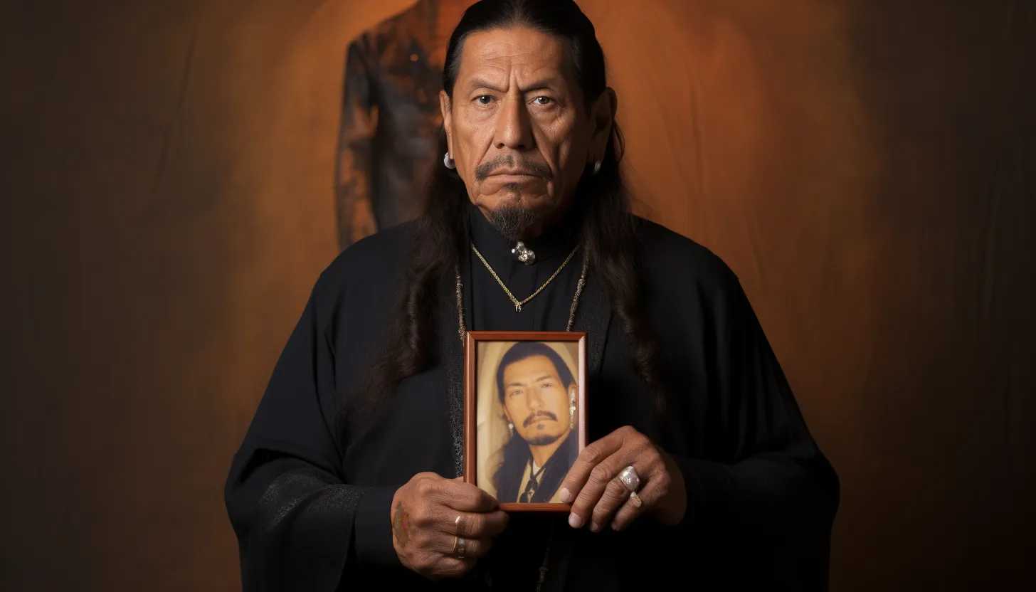 A frame capturing a contemplative Trejo in the present day, holding a photo of his younger self, symbol of his journey from a prisoner to a Hollywood star, taken with a Sony A7R IV.